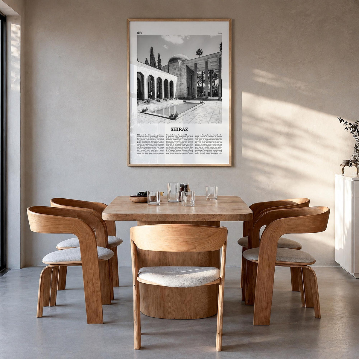 Shiraz black & white newspaper poster of Iran – vertical wall art in natural wood frame, hanging on wall