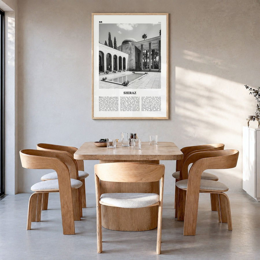 Shiraz Newspaper Poster in a natural wood frame, hanging in a dining room