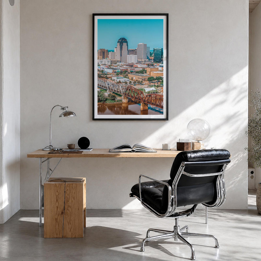 Shreveport colorful photo poster of Louisiana, USA – vertical wall art in black wood frame with white border, hanging on wall