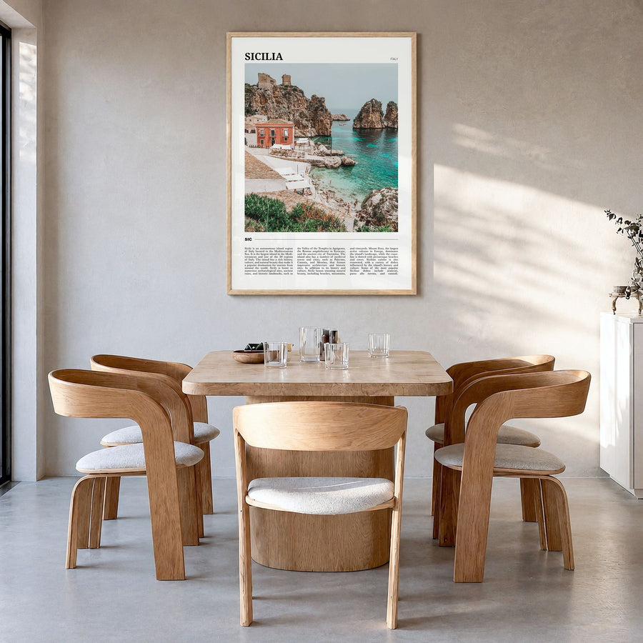 Sicilia Travel Poster in a natural wood frame, hanging in a dining room