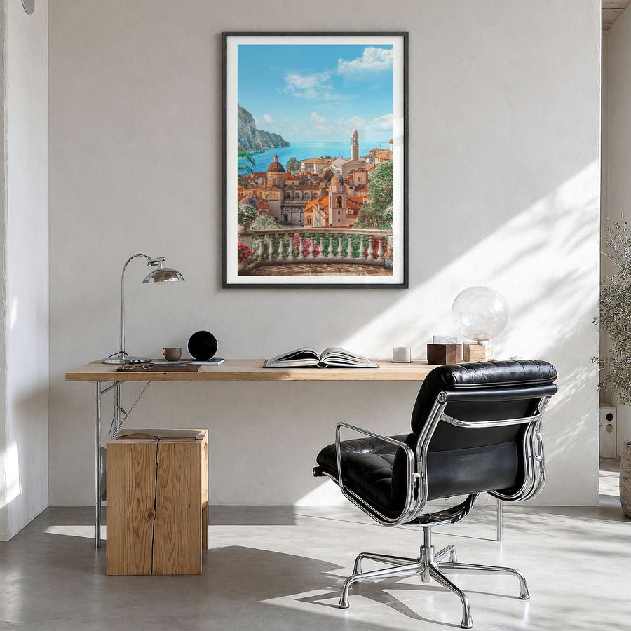 Sicily Photo Poster in a black wood frame, hanging in a bright home office, white border