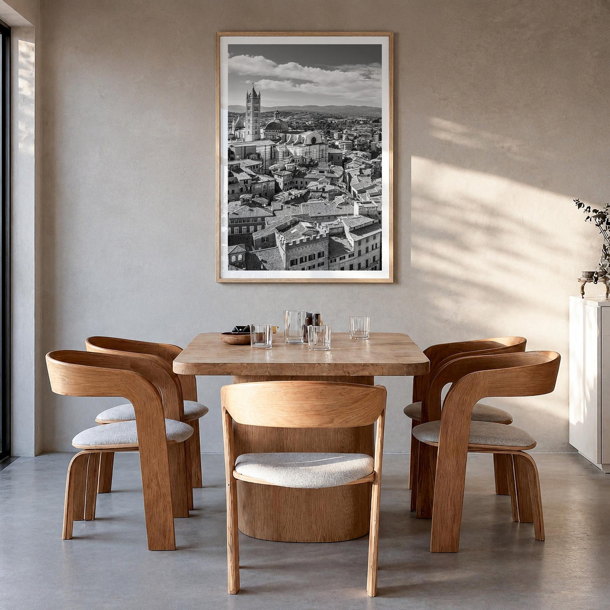 Siena black & white photo poster of Italy – vertical wall art in natural wood frame with white border, hanging on wall