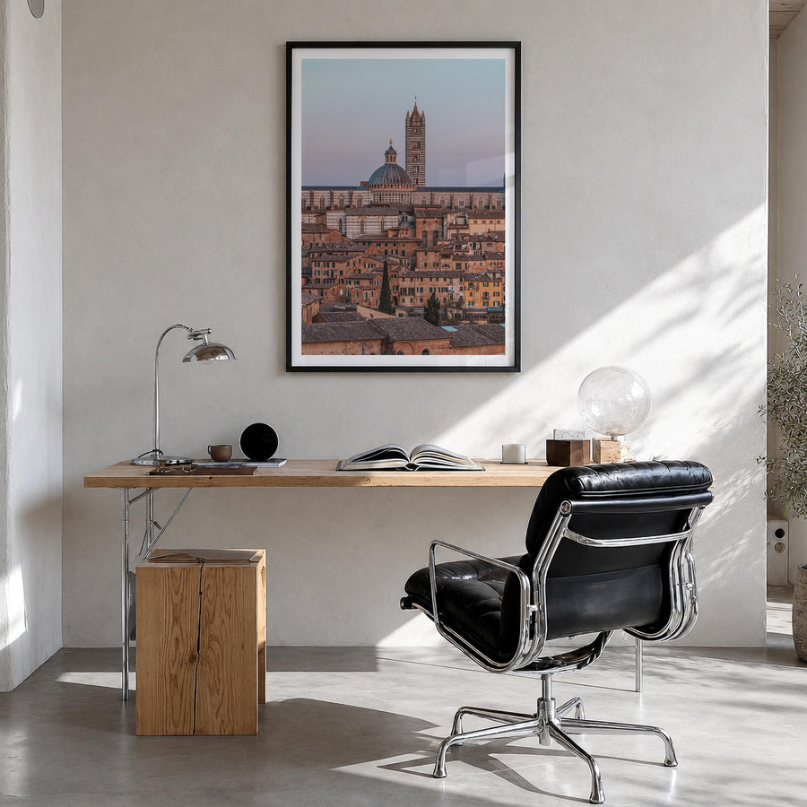 Siena colorful photo poster of Italy – vertical wall art in black wood frame with white border, hanging on wall
