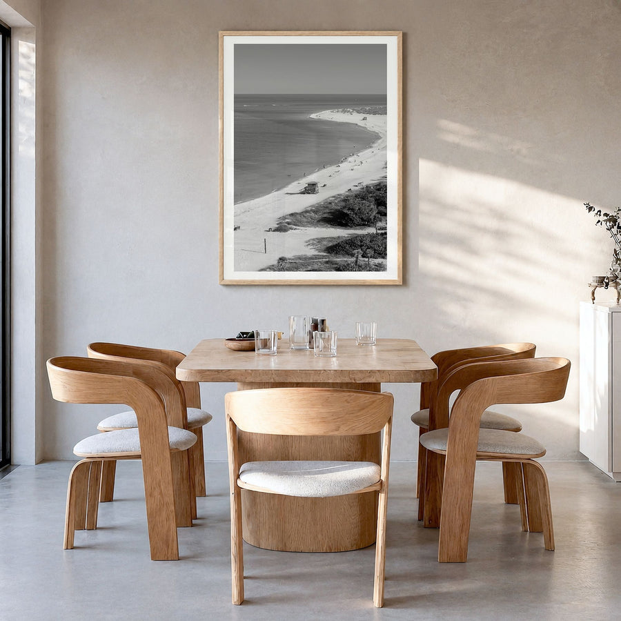 Siesta Key Photo Poster in a natural wood frame, hanging in a dining room, white border
