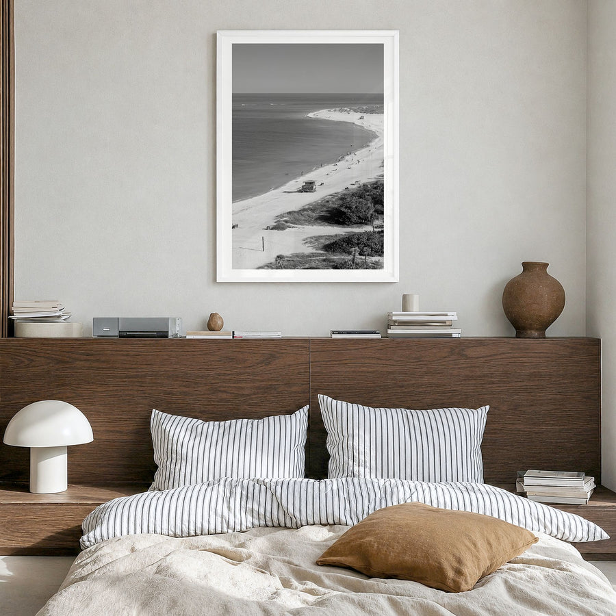 Siesta Key Photo Poster in a white wood frame, hanging in a bedroom, white border