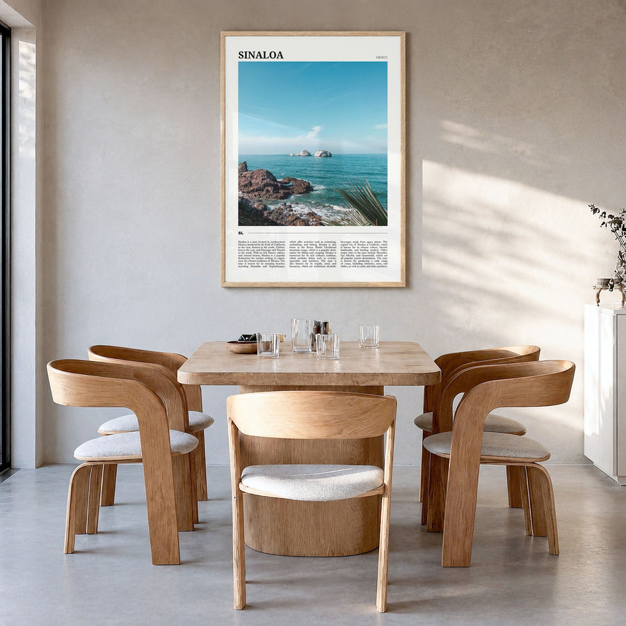 Sinaloa Travel Poster in a natural wood frame, hanging in a dining room