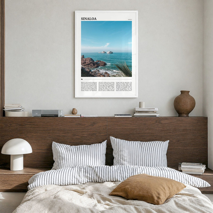 Sinaloa Travel Poster in a white wood frame, hanging in a bedroom