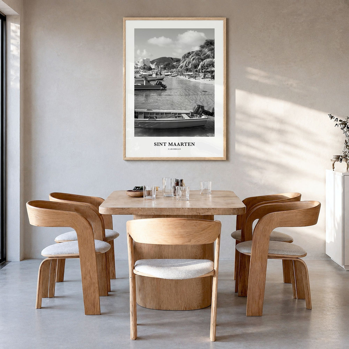 Sint Maarten Classic No 1 Poster in a natural wood frame, hanging in a dining room