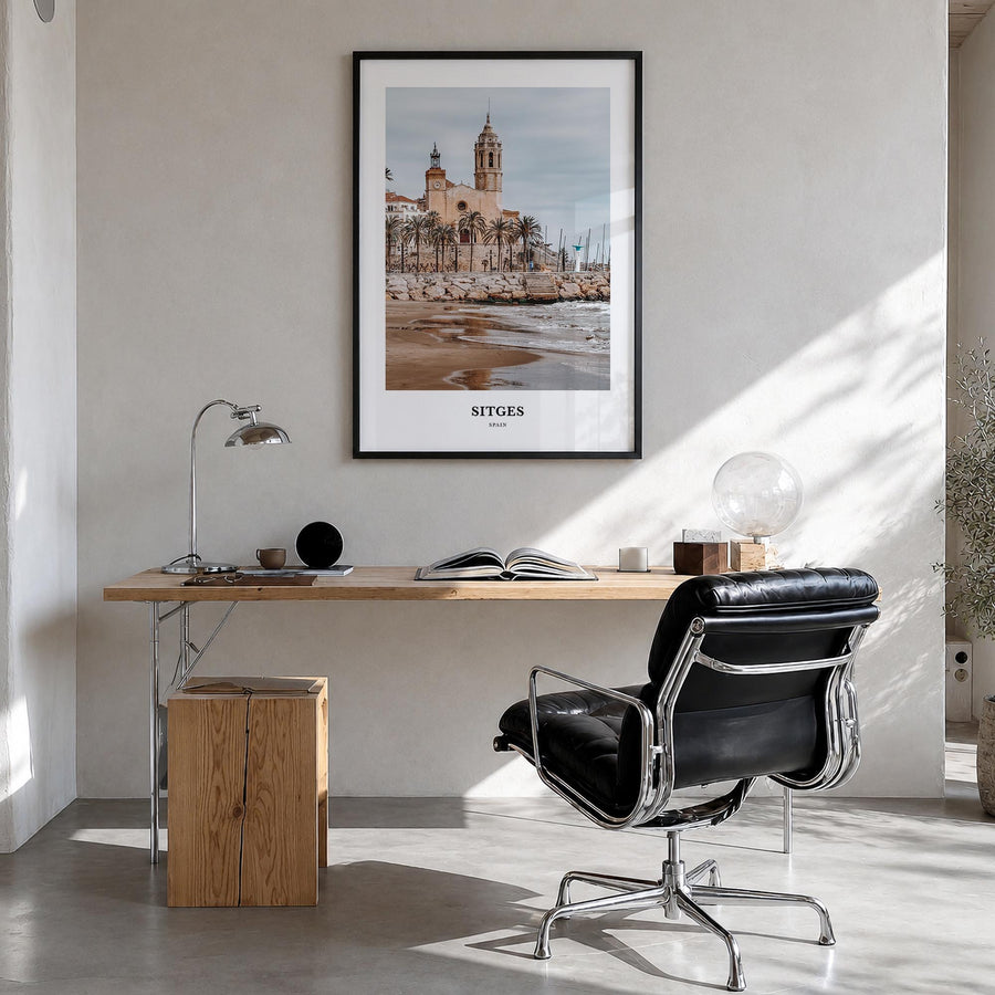 Sitges colorful classic poster of Spain – vertical wall art in black wood frame, hanging on wall