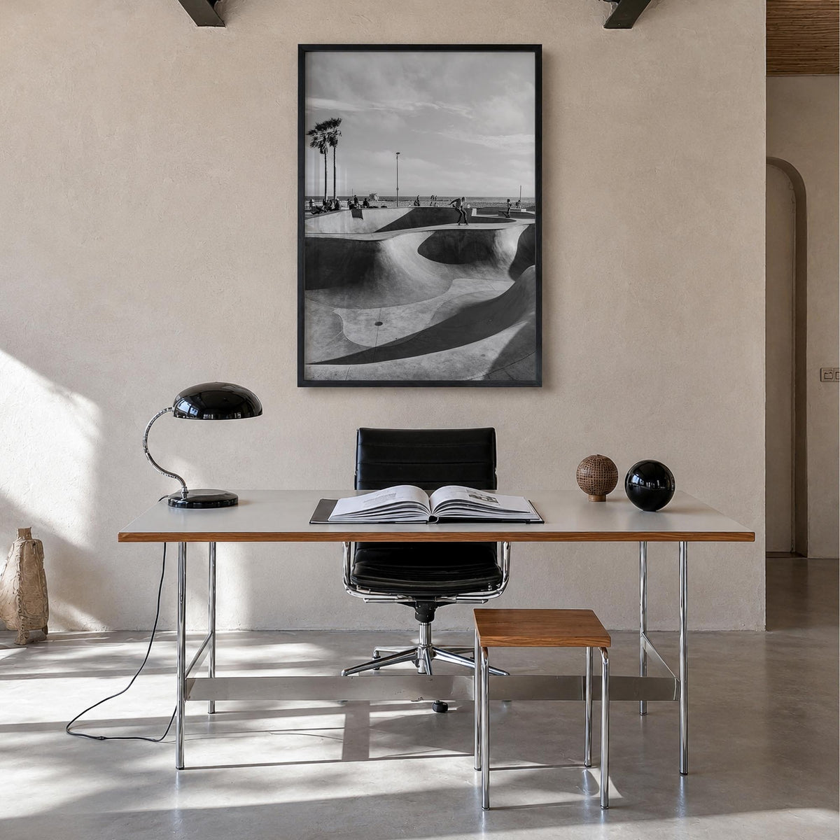 Skateboard no. 2 black & white photo poster – vertical wall art in black wood frame, hanging on wall