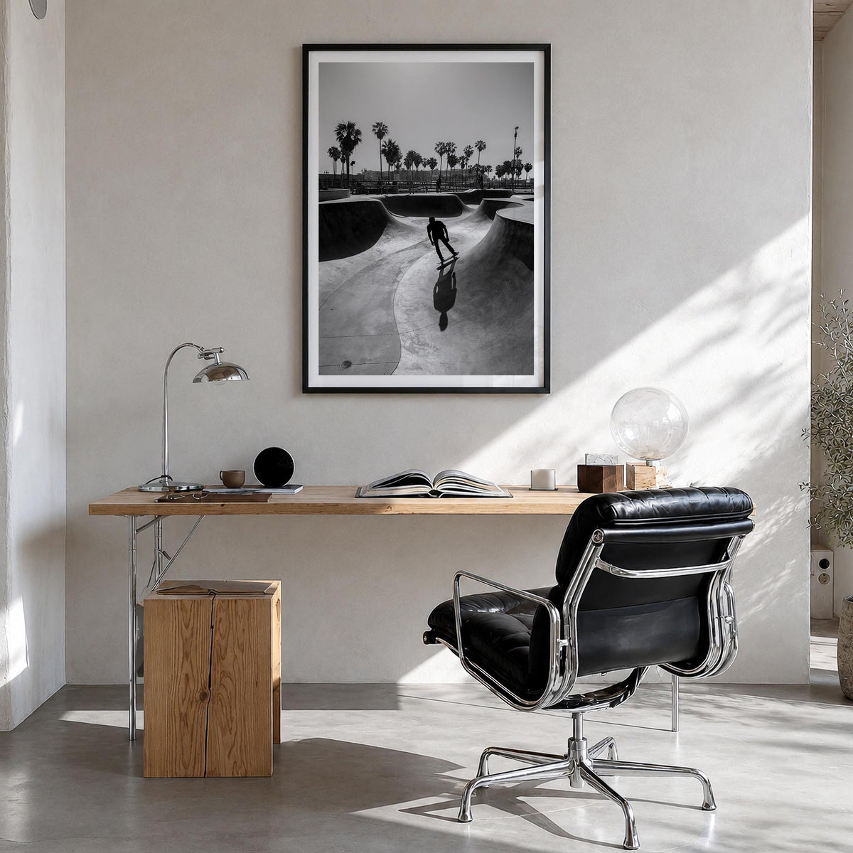 Skateboard no. 3 black & white photo poster – vertical wall art in black wood frame with white border, hanging on wall