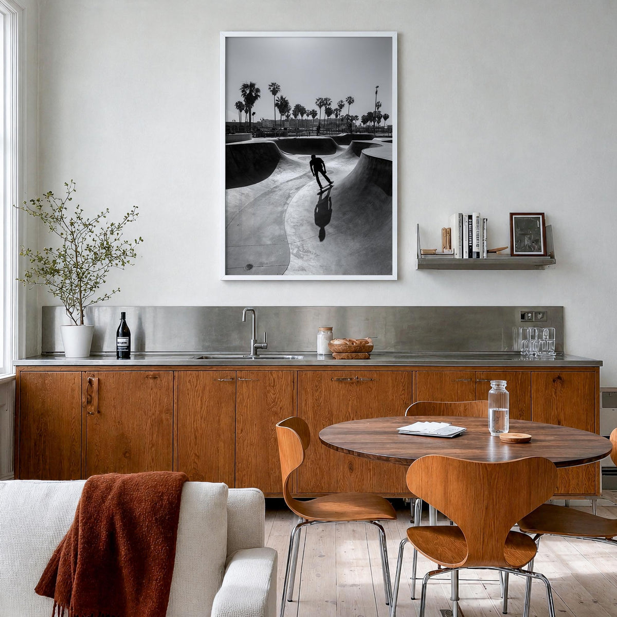 Skateboard no. 3 black & white photo poster – vertical wall art in white wood frame, hanging on wall