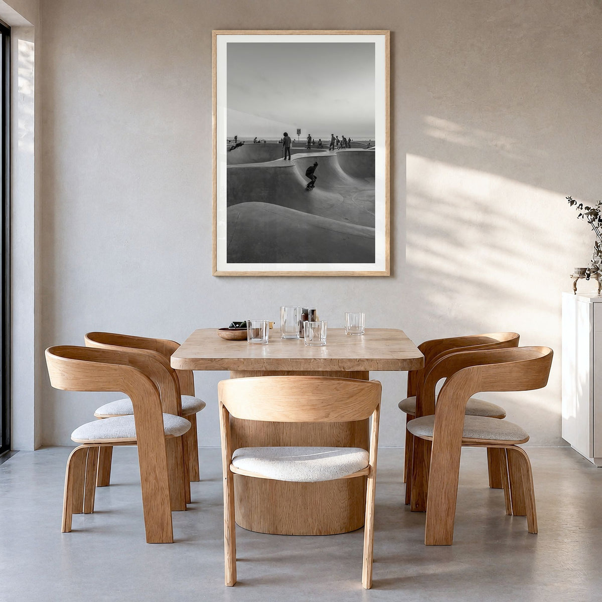 Skateboard Photo No 1 Poster in a natural wood frame, hanging in a dining room, white border