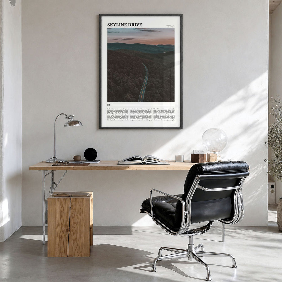 Skyline Drive Travel Poster in a black wood frame, hanging in a bright home office