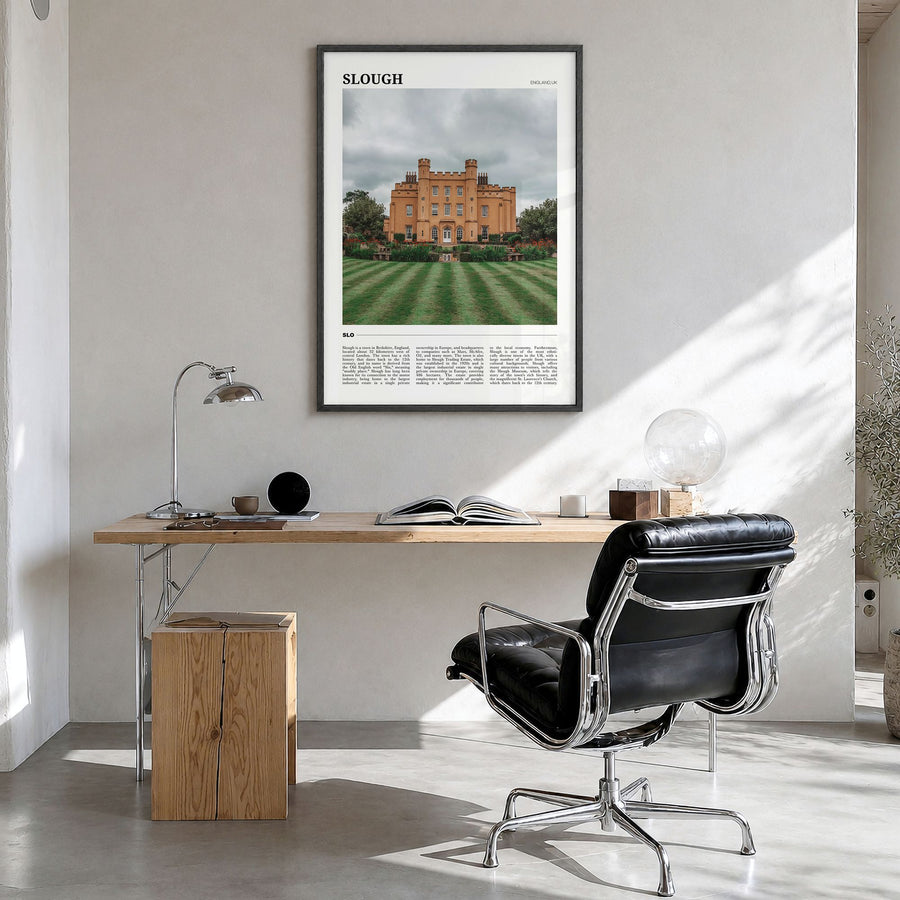 Slough Travel Poster in a black wood frame, hanging in a bright home office