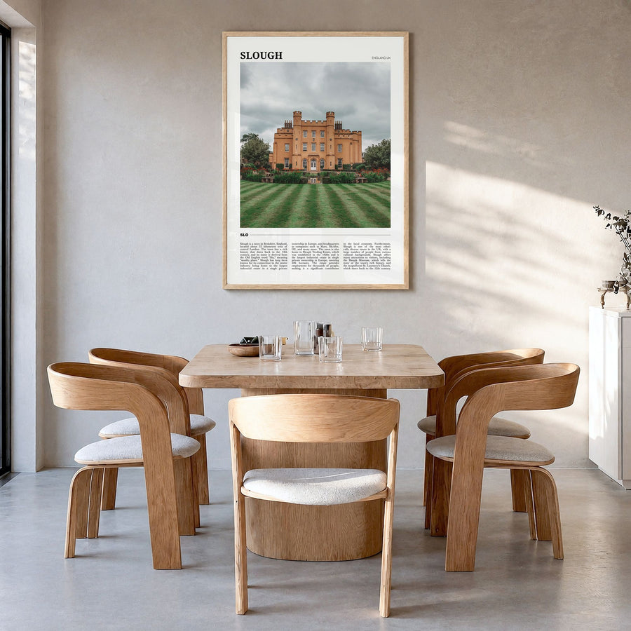 Slough Travel Poster in a natural wood frame, hanging in a dining room
