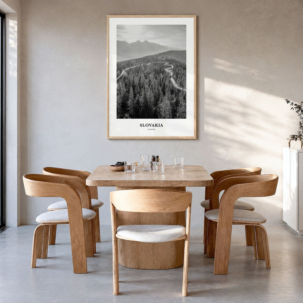 Slovakia Classic Poster in a natural wood frame, hanging in a dining room