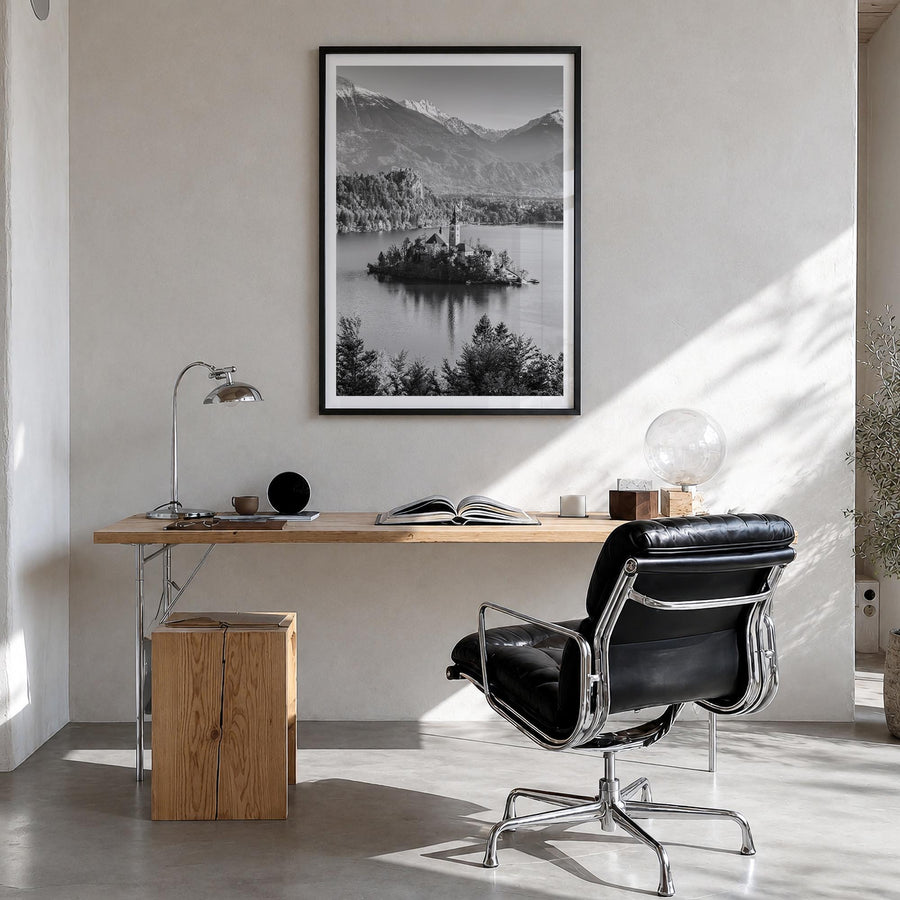 Slovenia black & white photo poster of Europe – vertical wall art in black wood frame with white border, hanging on wall