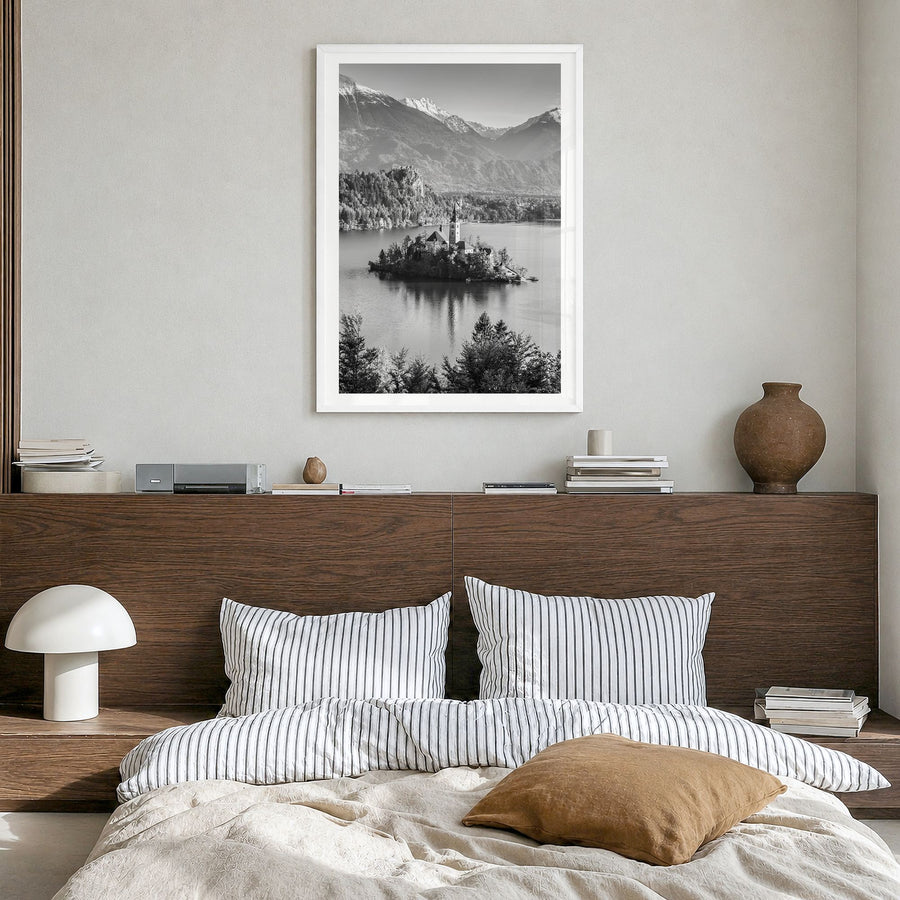 Slovenia Photo Poster in a white wood frame, hanging in a bedroom, white border