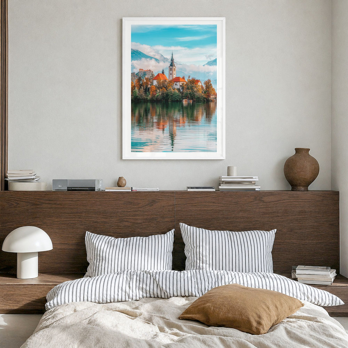 Slovenia Photo Poster in a white wood frame, hanging in a bedroom, white border