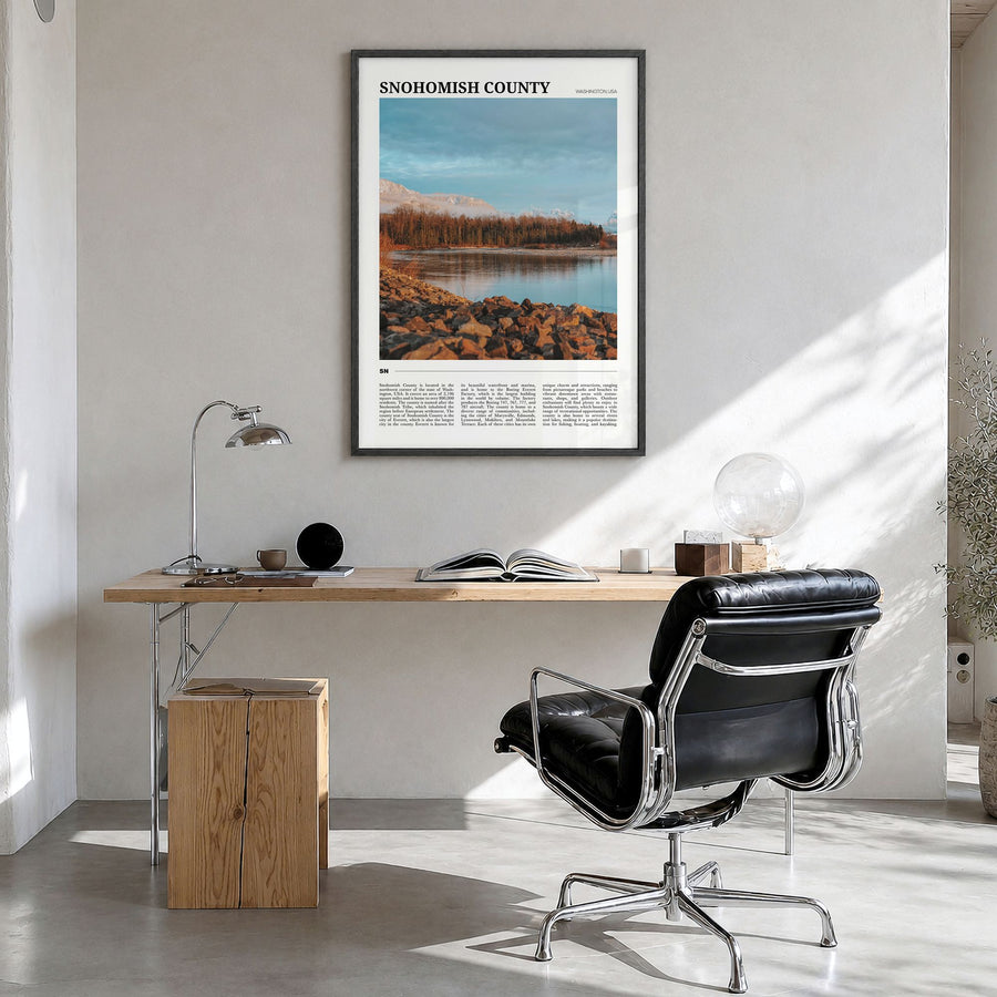 Snohomish County Travel Poster in a black wood frame, hanging in a bright home office