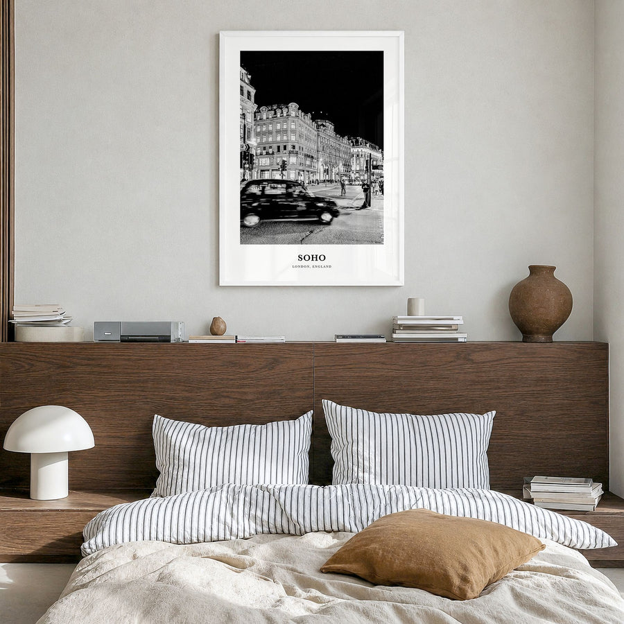 Soho, London Classic No 1 Poster in a white wood frame, hanging in a bedroom