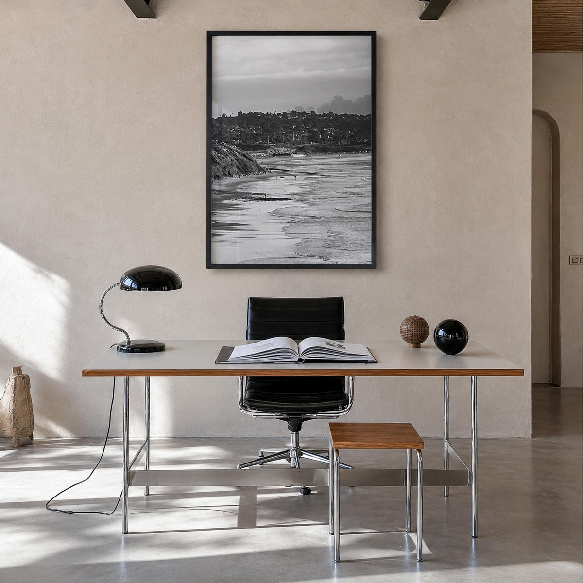 Solana Beach black & white photo poster of California, USA – vertical wall art in black wood frame, hanging on wall