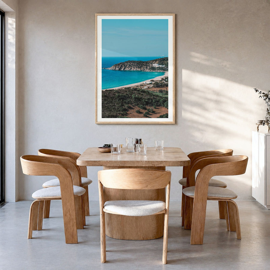 Solana Beach Photo Poster in a natural wood frame, hanging in a dining room, white border