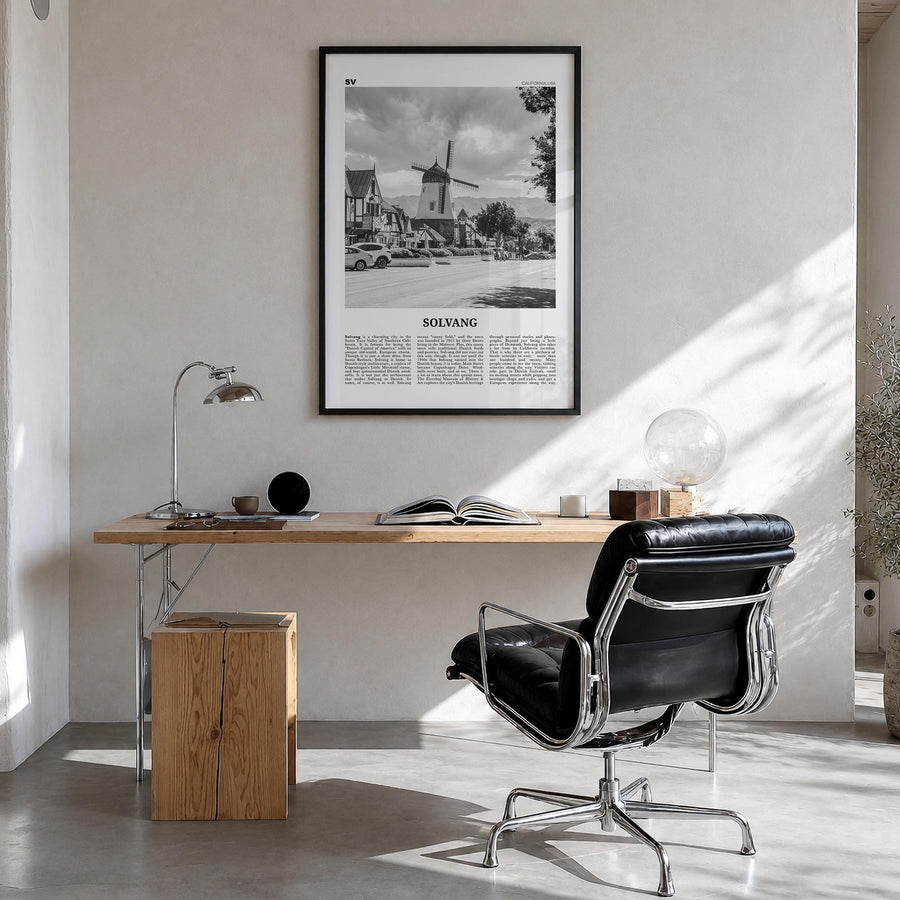Solvang black & white newspaper poster of California, USA – vertical wall art in black wood frame, hanging on wall