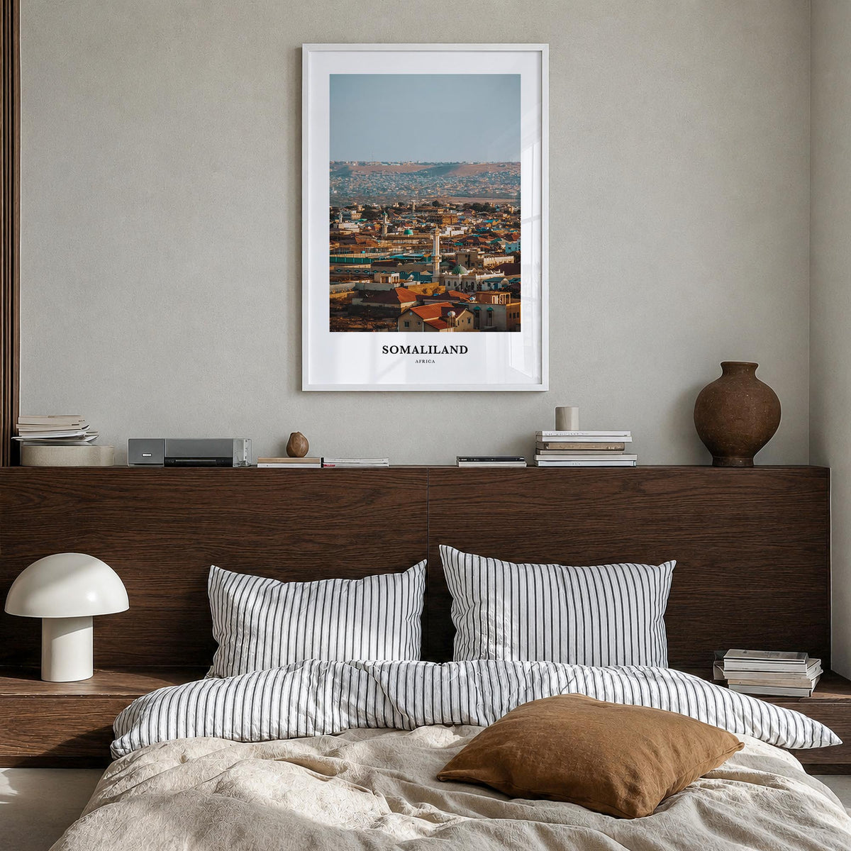 Somaliland colorful classic poster of Africa – vertical wall art in white wood frame, hanging on wall