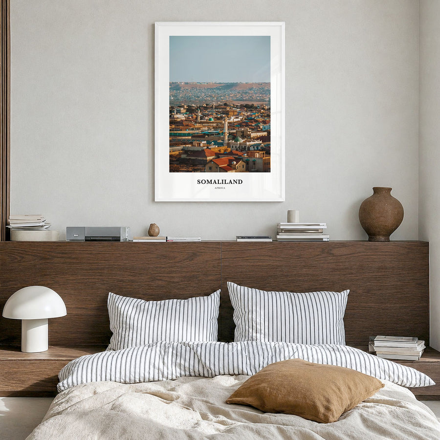 Somaliland Classic Poster in a white wood frame, hanging in a bedroom