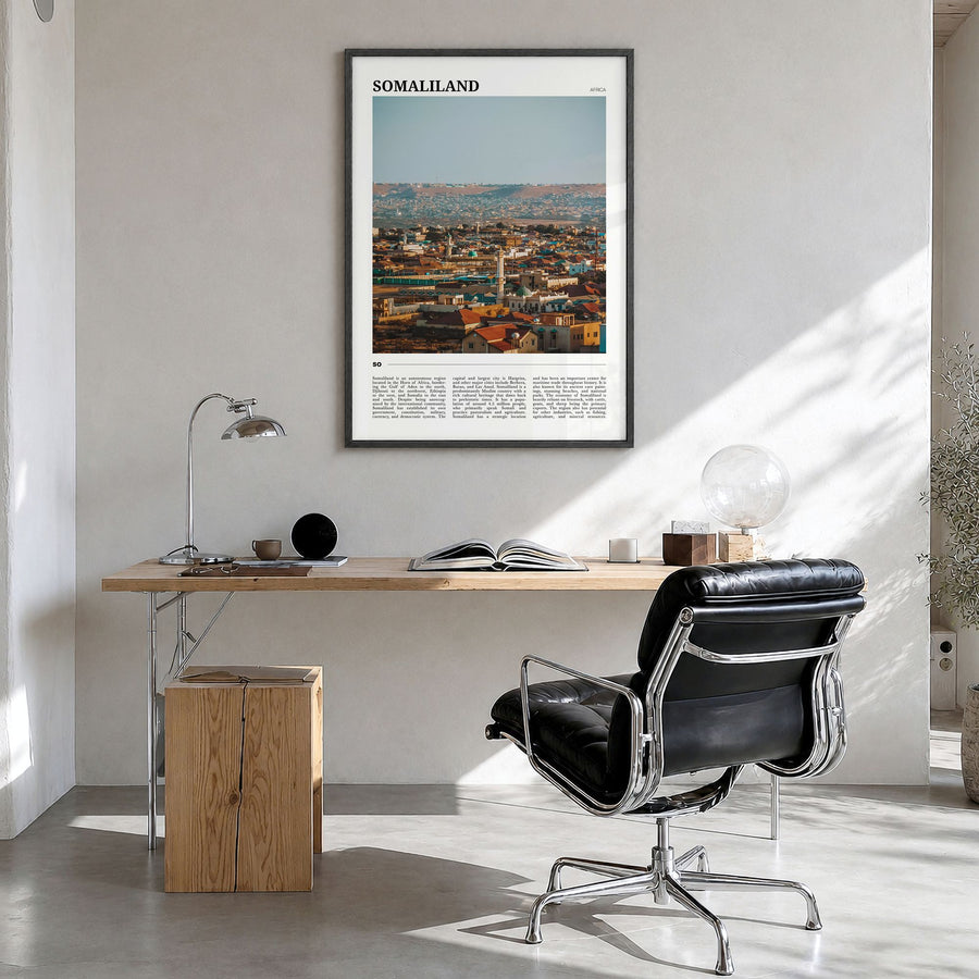 Somaliland Travel Poster in a black wood frame, hanging in a bright home office