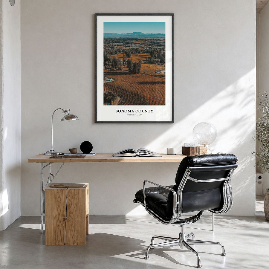 Sonoma County Classic Poster in a black wood frame, hanging in a bright home office
