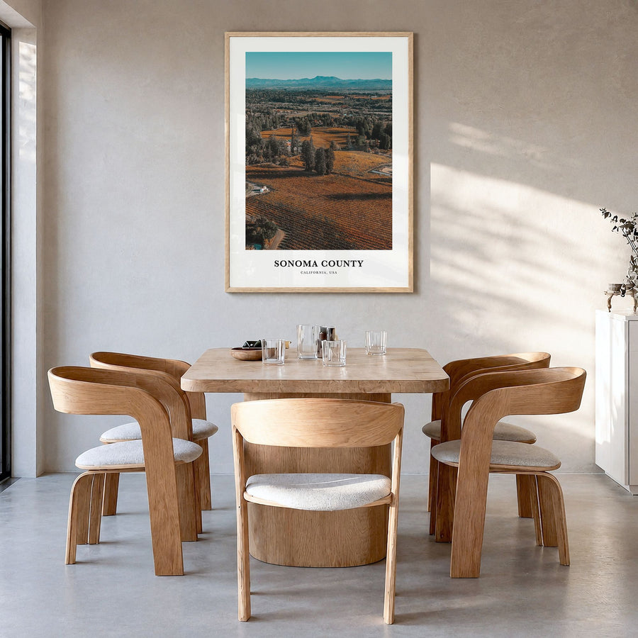 Sonoma County Classic Poster in a natural wood frame, hanging in a dining room