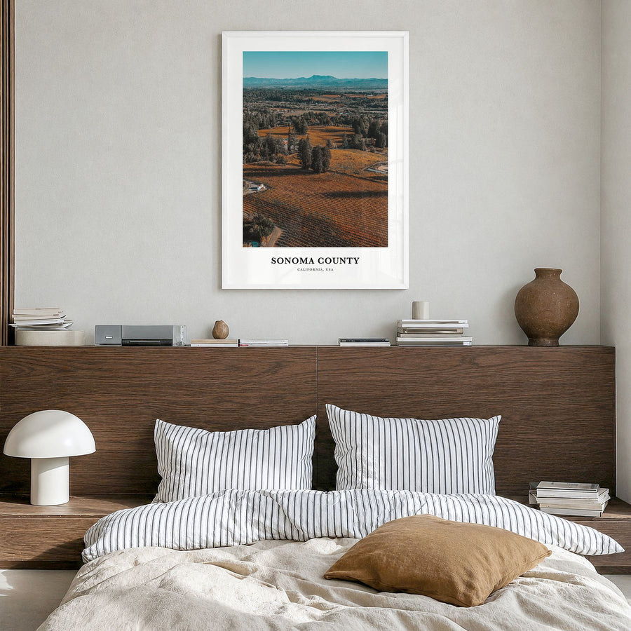 Sonoma County Classic Poster in a white wood frame, hanging in a bedroom