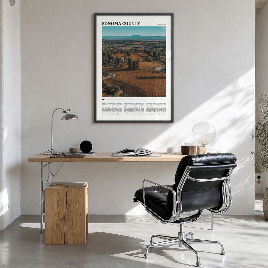 Sonoma County Travel Poster in a black wood frame, hanging in a bright home office