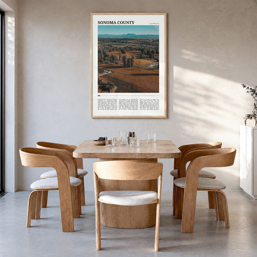 Sonoma County Travel Poster in a natural wood frame, hanging in a dining room