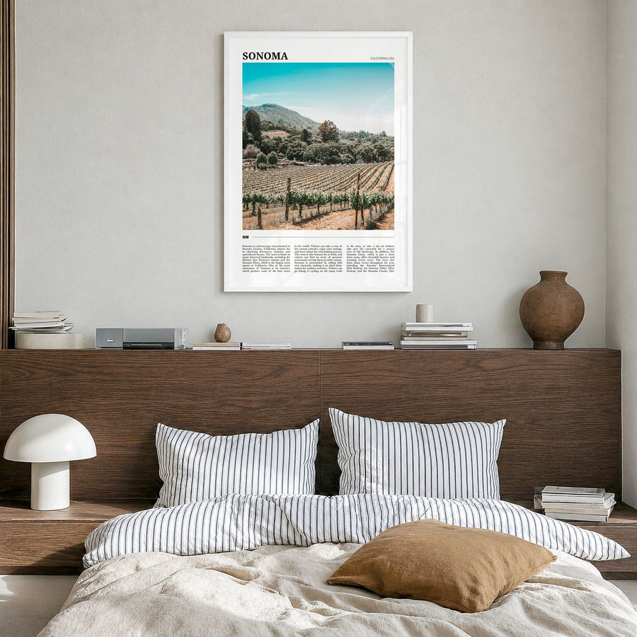 Sonoma Travel Poster in a white wood frame, hanging in a bedroom