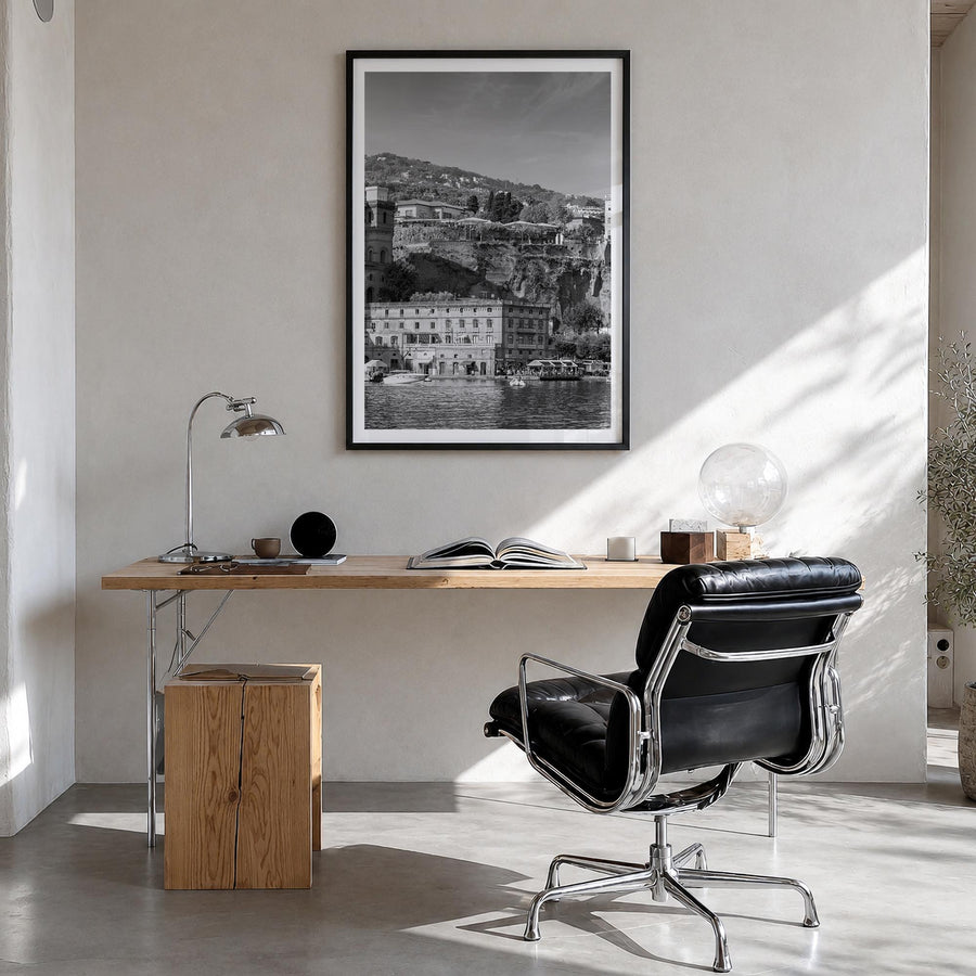 Sorrento, Italy black & white photo poster of Italy – vertical wall art in black wood frame with white border, hanging on wal