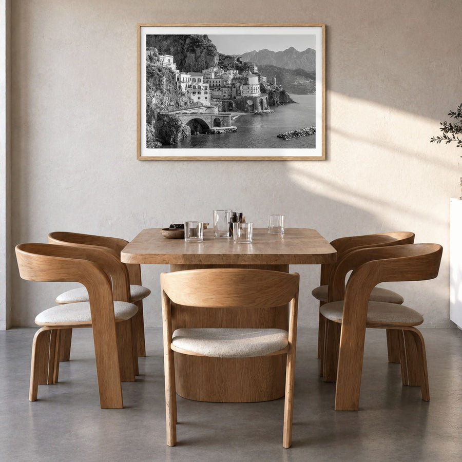Sorrento, Italy Photo Poster in a natural wood frame, hanging in a dining room, white border