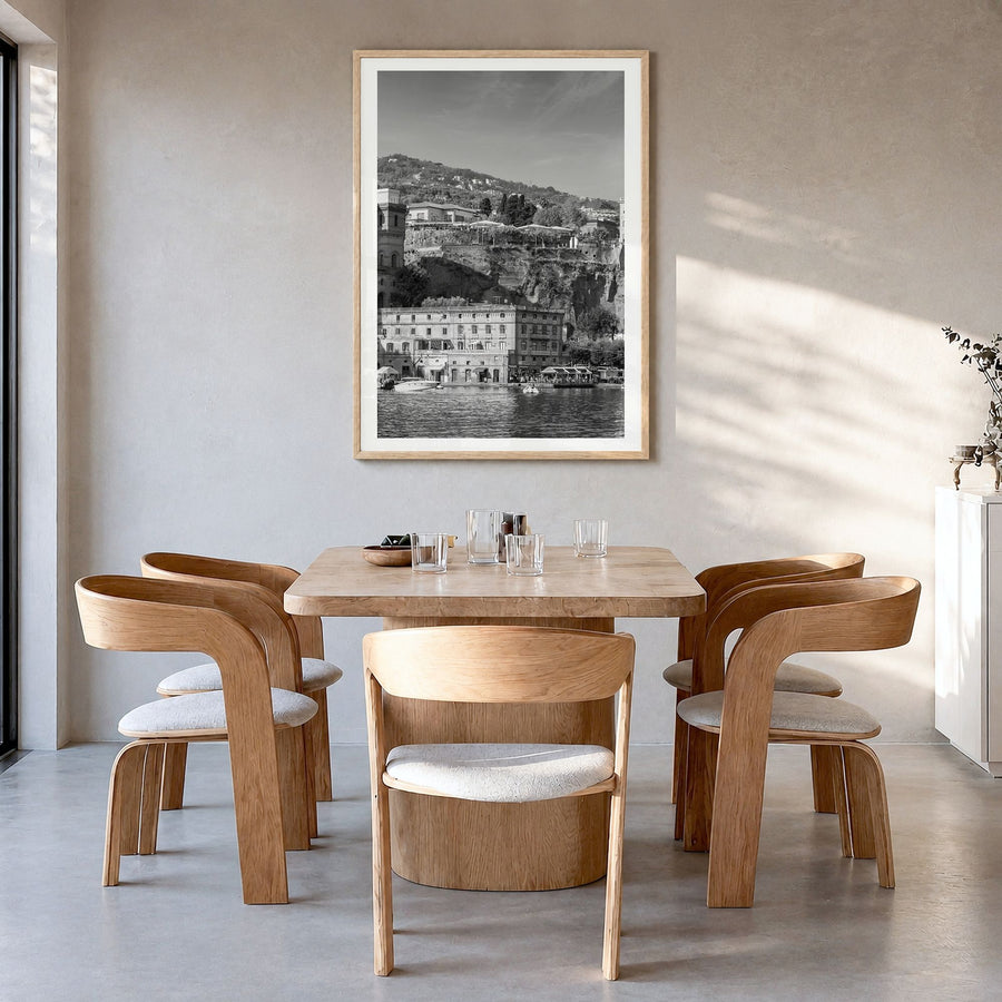 Sorrento, Italy Photo Poster in a natural wood frame, hanging in a dining room, white border