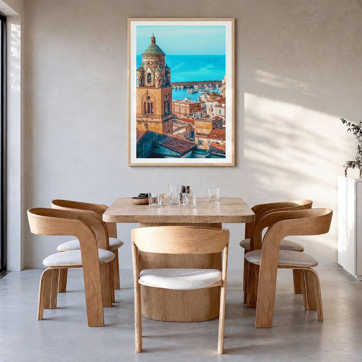 Sorrento, Italy Photo Poster in a natural wood frame, hanging in a dining room, white border