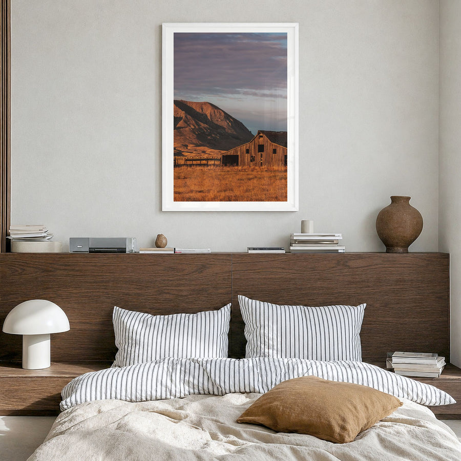 South Dakota Photo Poster in a white wood frame, hanging in a bedroom, white border
