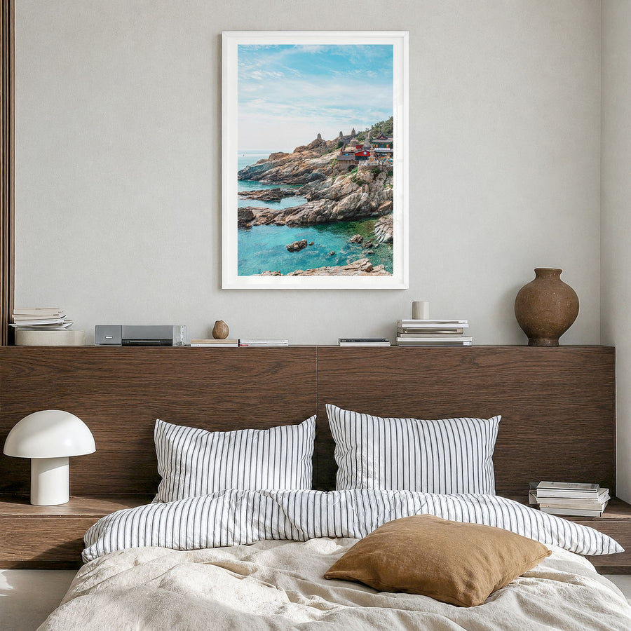 South Korea Photo Poster in a white wood frame, hanging in a bedroom, white border