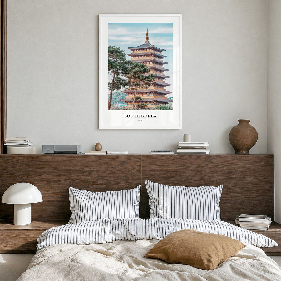 South Korea Classic Poster in a white wood frame, hanging in a bedroom