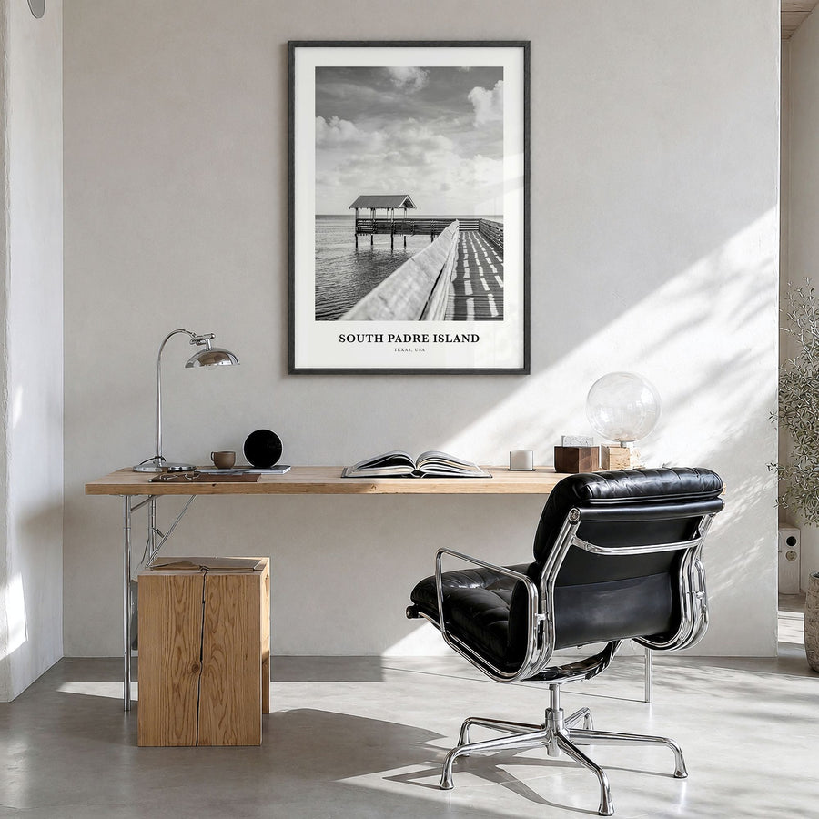South Padre Island Classic Poster in a black wood frame, hanging in a bright home office
