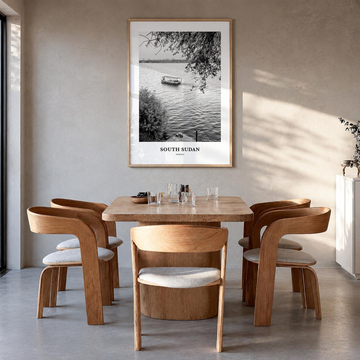 South Sudan black & white classic poster of Africa – vertical wall art in natural wood frame, hanging on wall