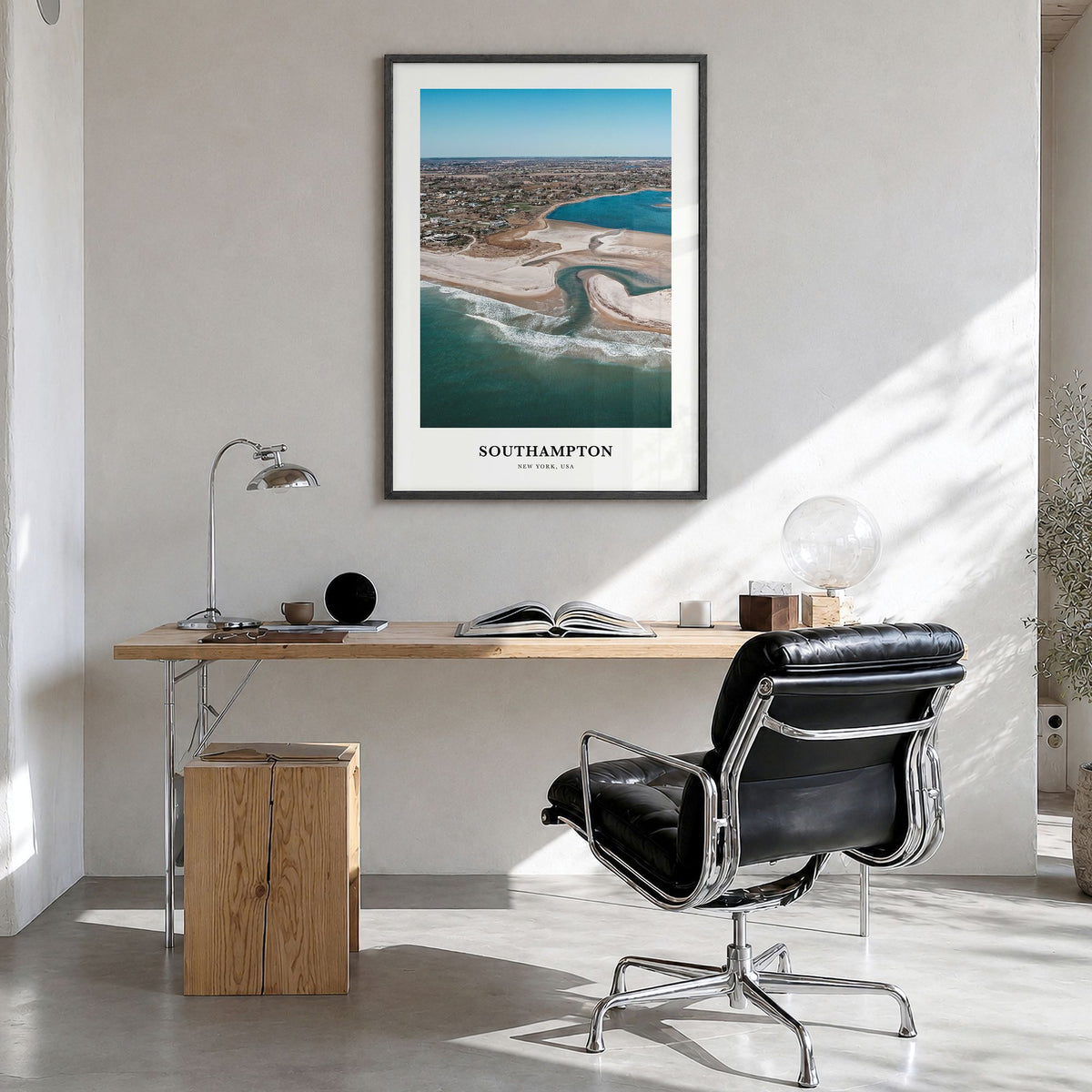 Southampton, New York Classic Poster in a black wood frame, hanging in a bright home office