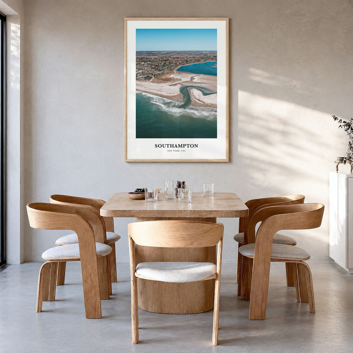 Southampton, New York Classic Poster in a natural wood frame, hanging in a dining room