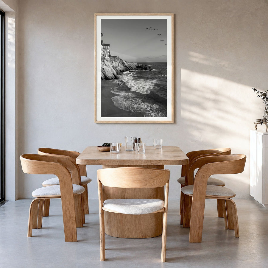 Southern California Photo Poster in a natural wood frame, hanging in a dining room, white border